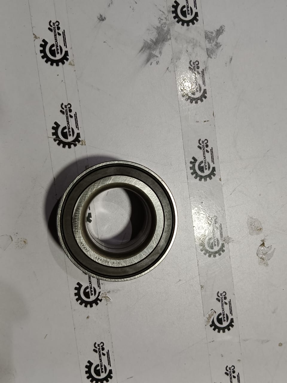 Ford Ecosport 2020 front wheel bearing, part ACPZ1215A, showing the metallic bearing component on a plain background.
