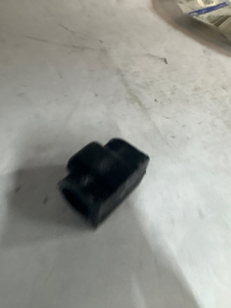 Ford J7BZ5484D insulator stabilize for vehicle stability and insulation, shown in a close-up image of the part.