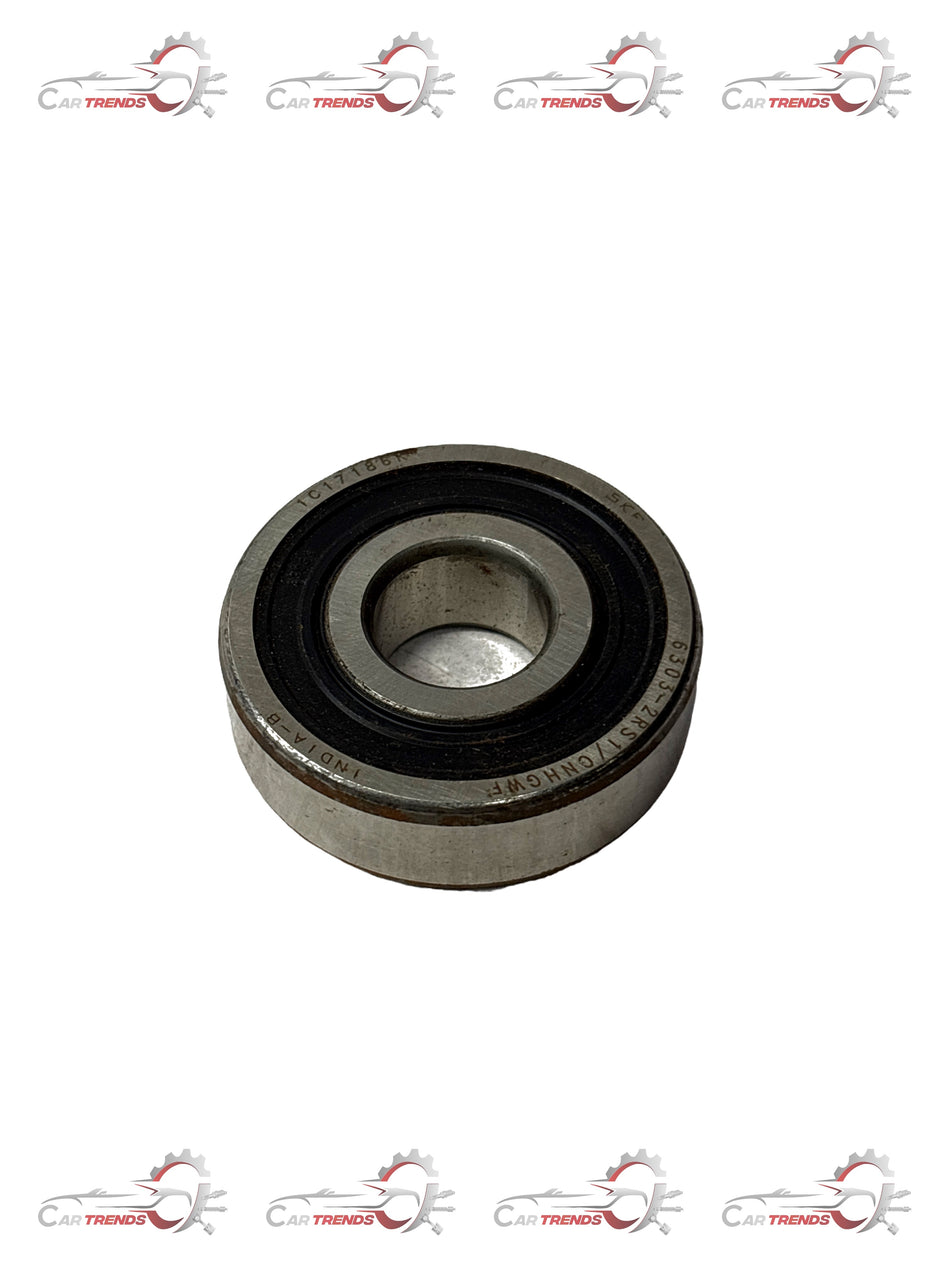 General Motors Tavera ball bearing T97598154, automotive engine component with metal and plastic parts, close-up view