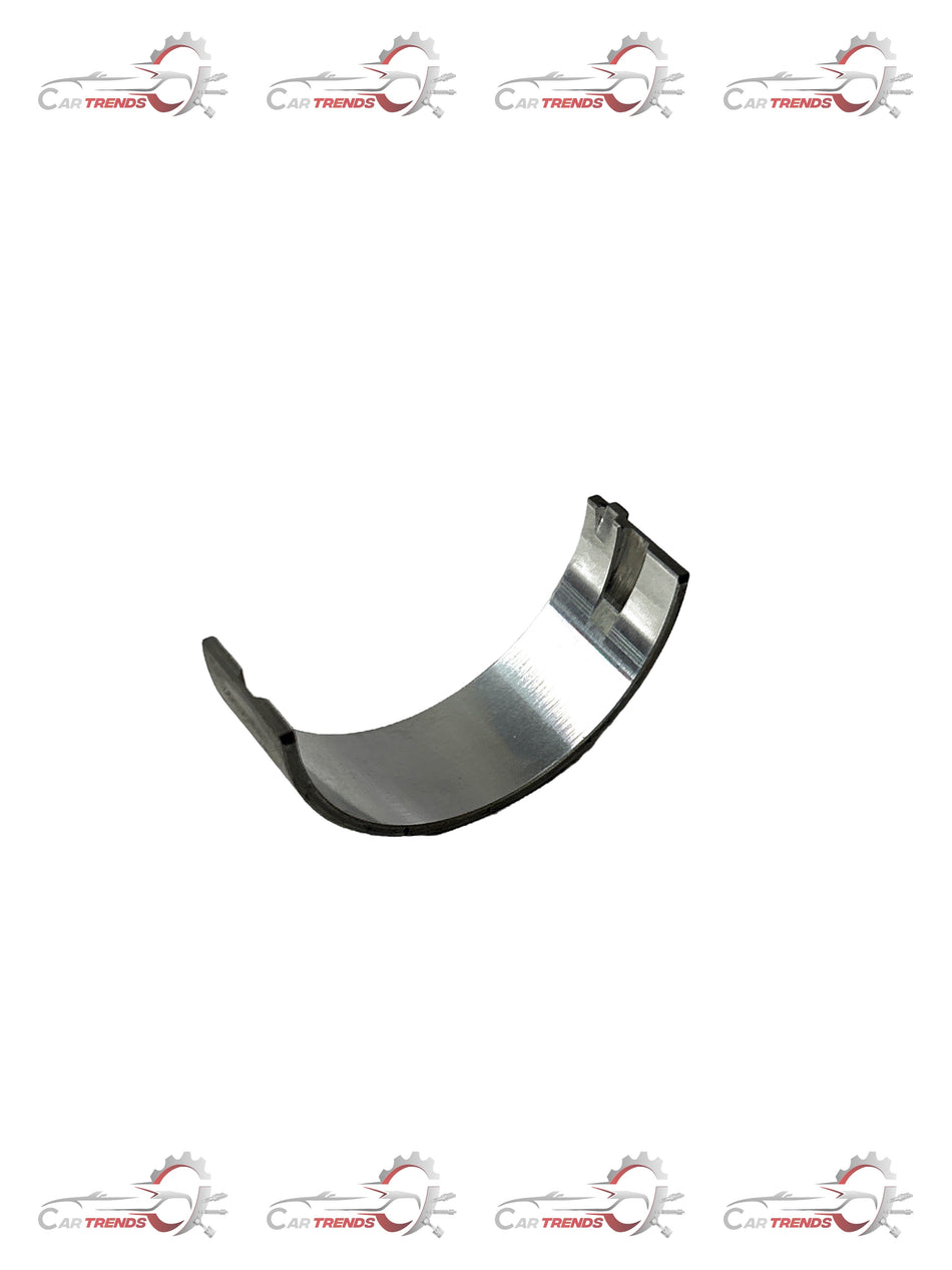 General Motors lower bearing CR SHF J55572982, automotive engine component, close-up view of the bearing part.