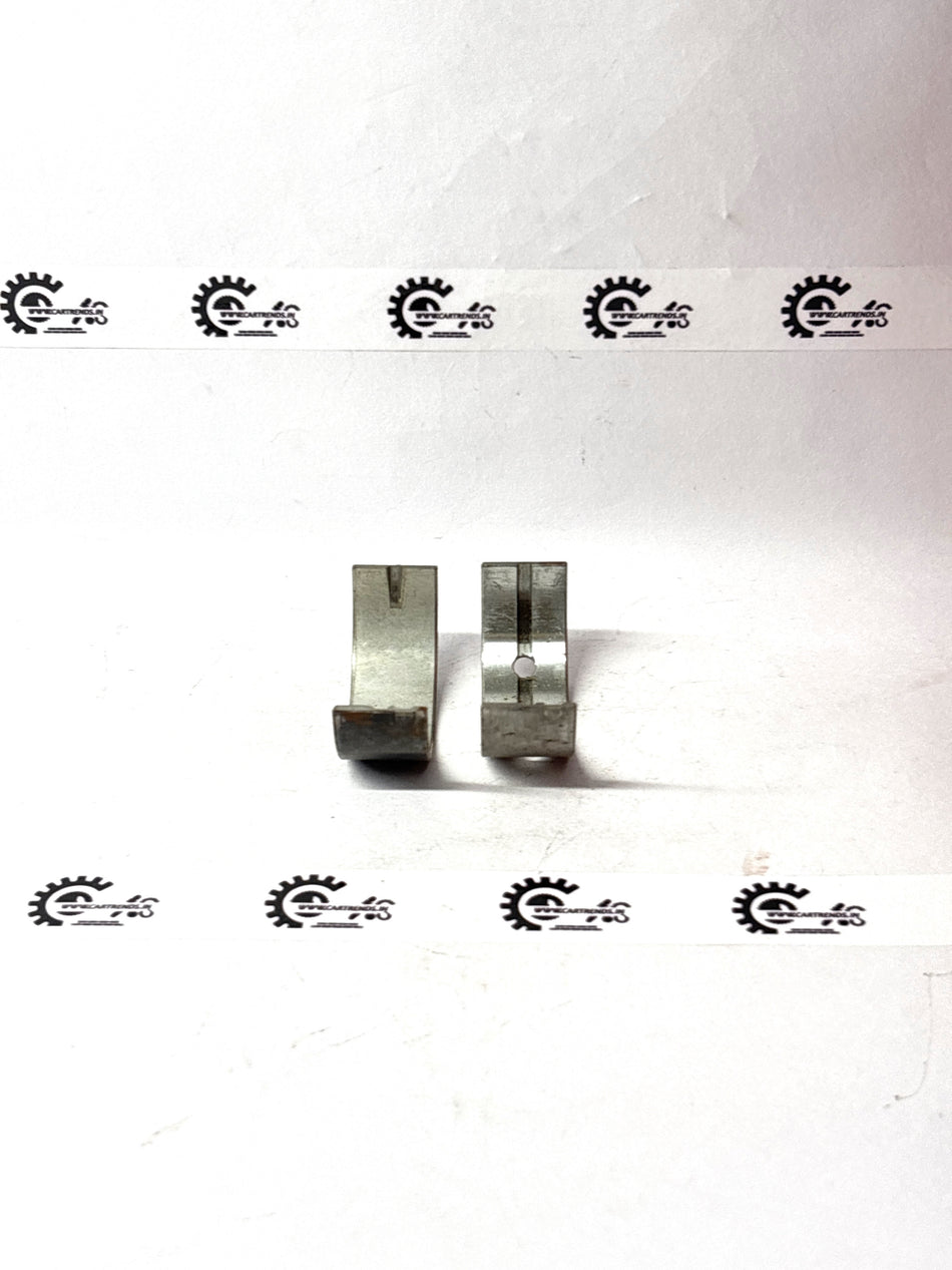 General Motors black crankshaft bearing set for Tavera, includes multiple bearings for engine repair and maintenance.