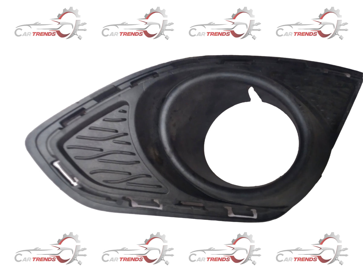 General Motors fog light bezel for front, part number LP BEAT J95214495, shown in a close-up image.