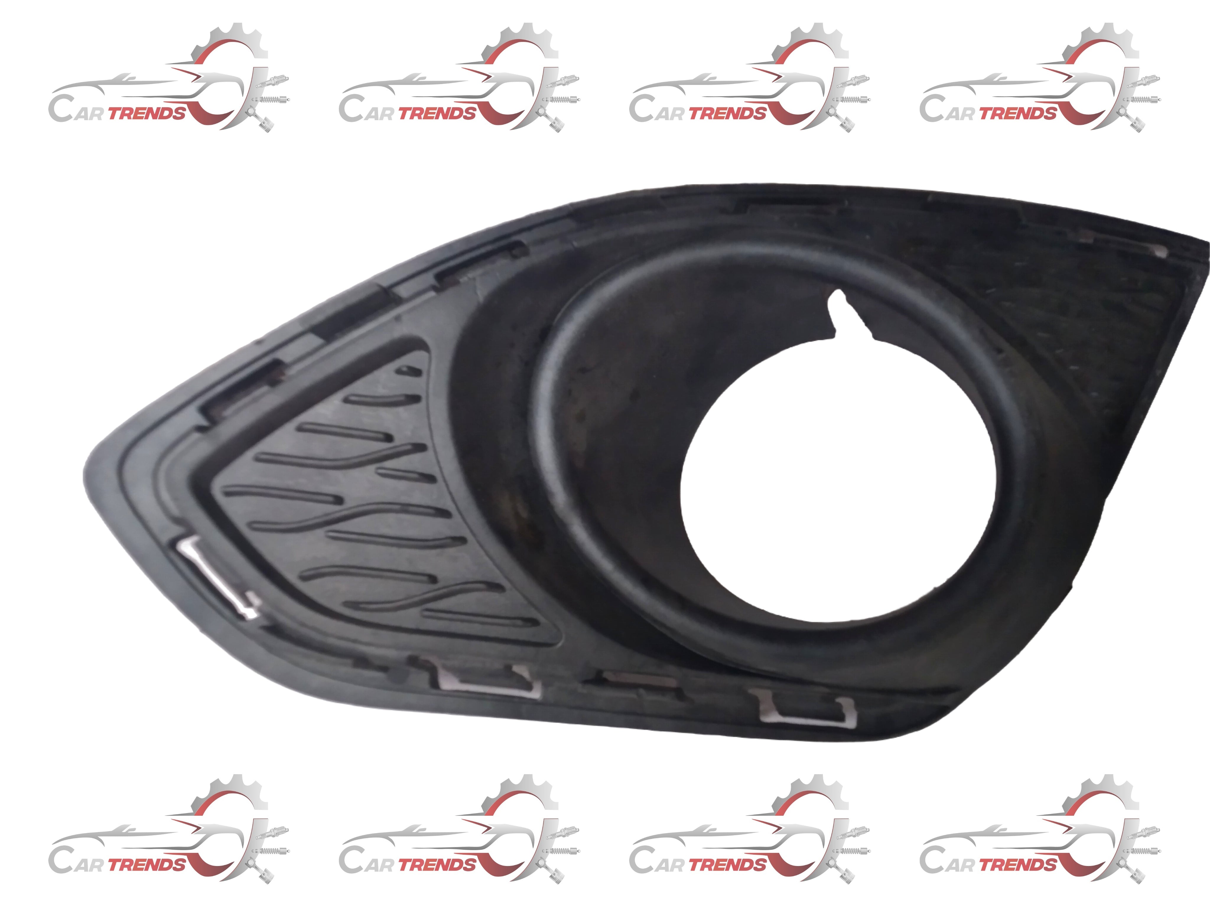 General Motors fog light bezel for front, part number LP BEAT J95214495, shown in a close-up image.