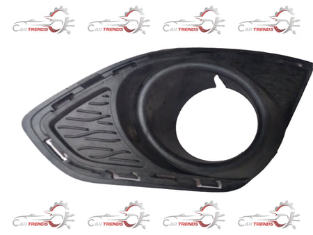 General Motors fog light bezel for front, part number LP BEAT J95214495, shown in a close-up image.