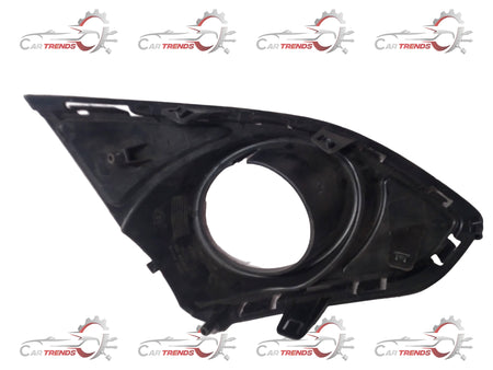 Front bezel for GM fog light assembly, part J95214495, showing a close-up of the bezel's shape and mounting surface.