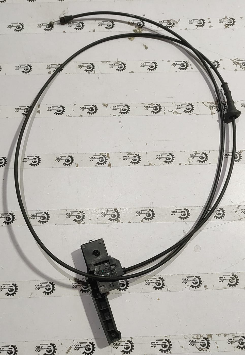 General Motors Bonet Cable for Cruze J96994964, automotive engine component, shown in a close-up view with detailed wiring.