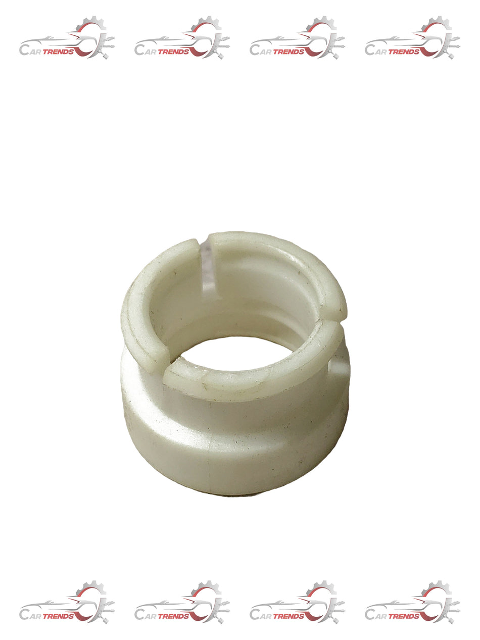 General Motors control lever pivot bushing for Corsa, part S90523058, shown on a vehicle's control arm in a close-up shot.