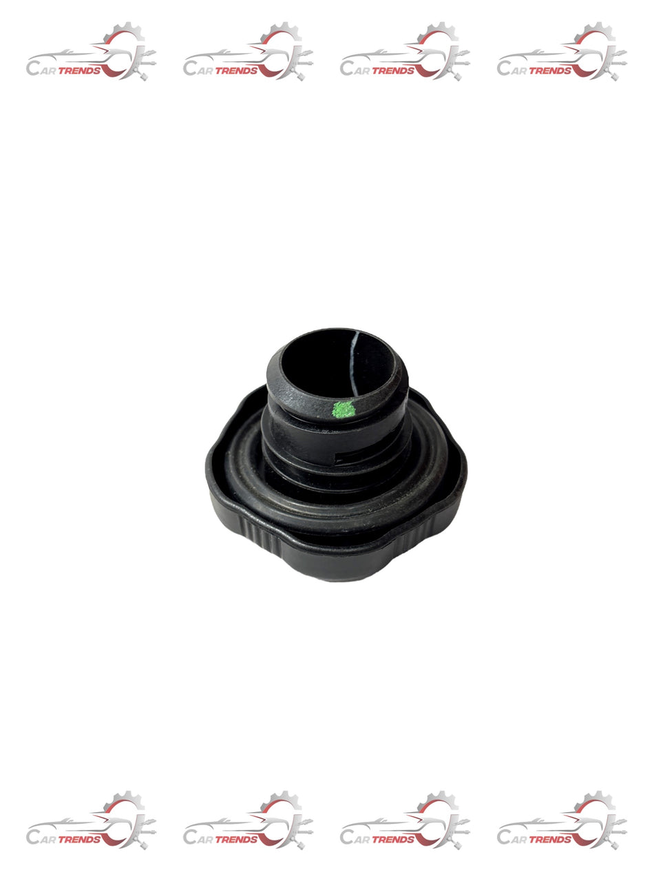 General Motors oil filter cap assembly J55579163, automotive part for engine oil filtration, black plastic with detailed design