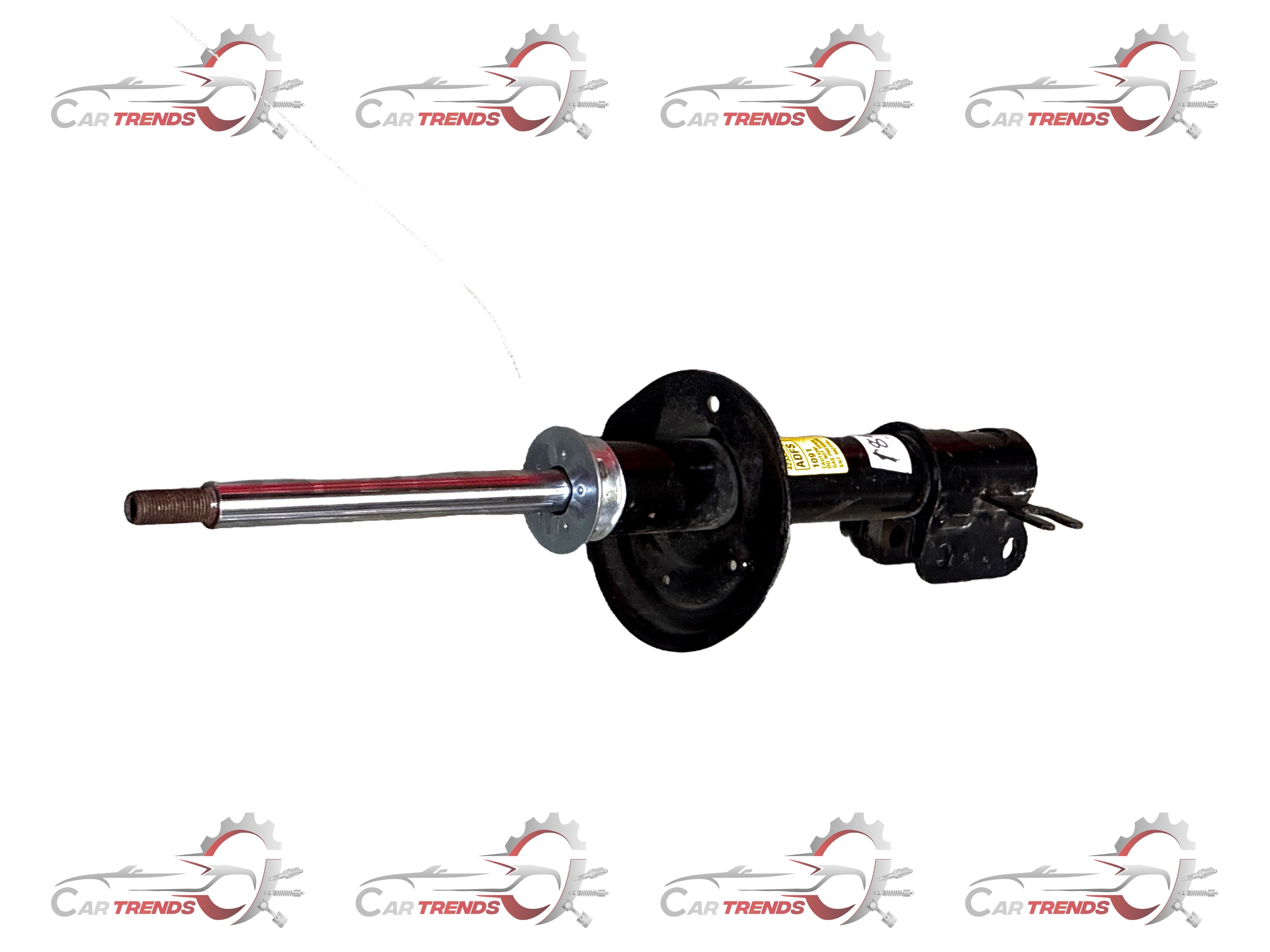 Chevrolet Beat front shock absorber by General Motors, Rh side, showing coil spring and mounting components.