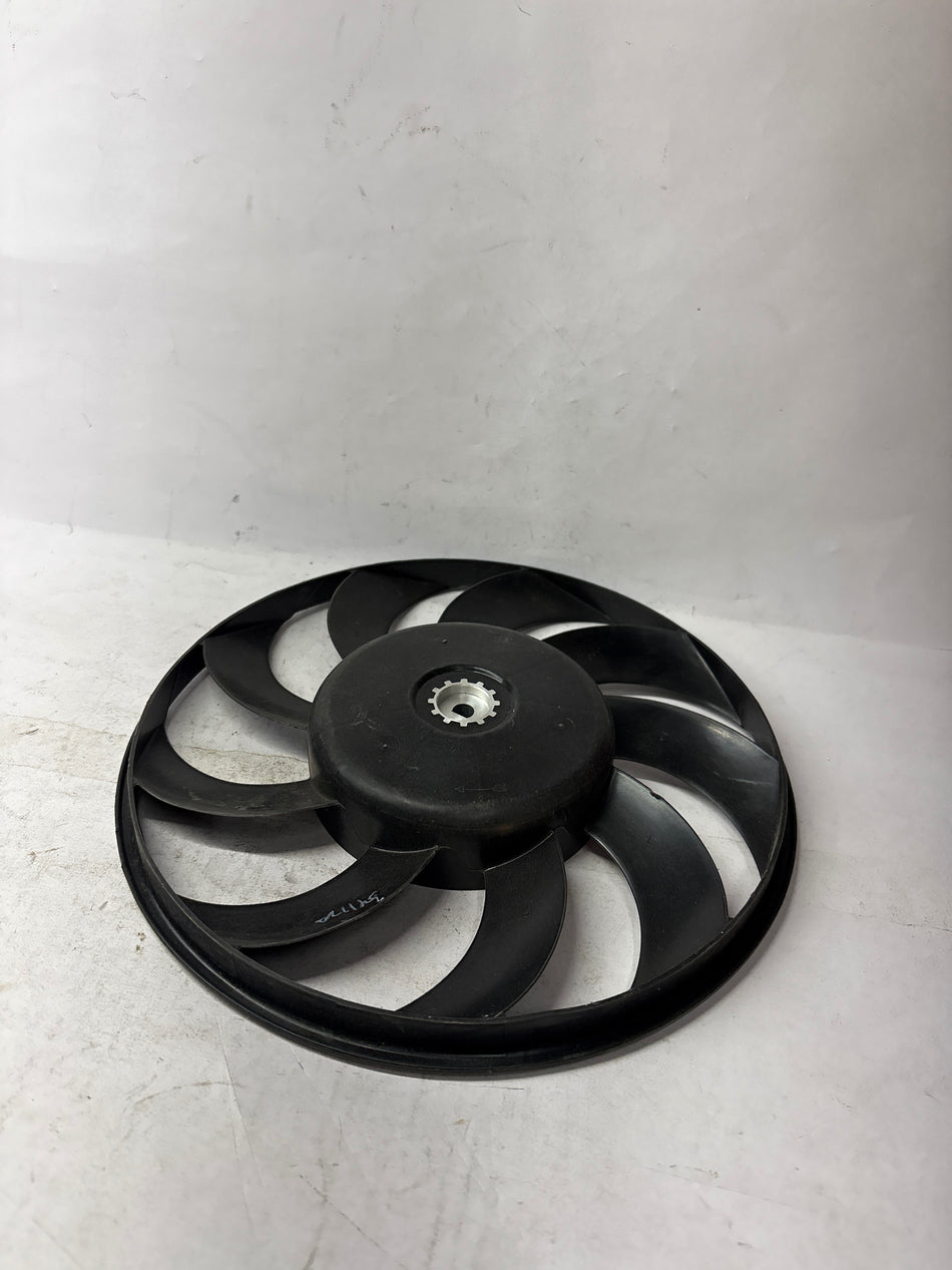 Cooling fan for Tavera 1st Gen by General Motors, car part with metal blades and mounting frame.