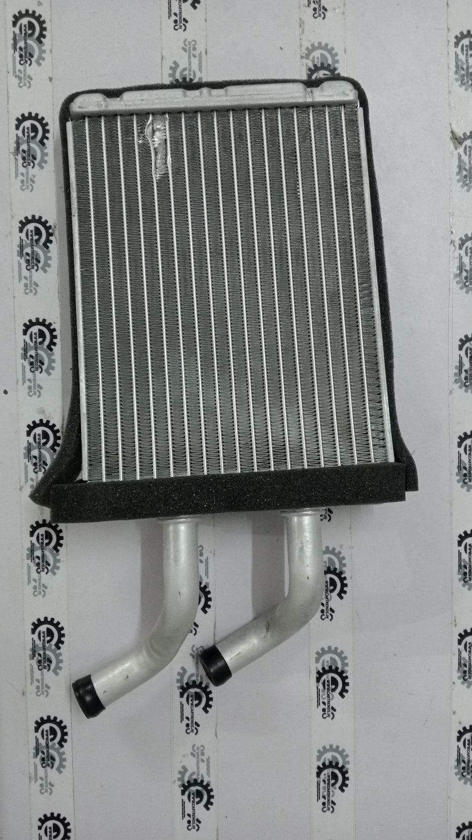 General Motors core heat exchanger for vehicle cooling system, shown in a detailed view of the part.