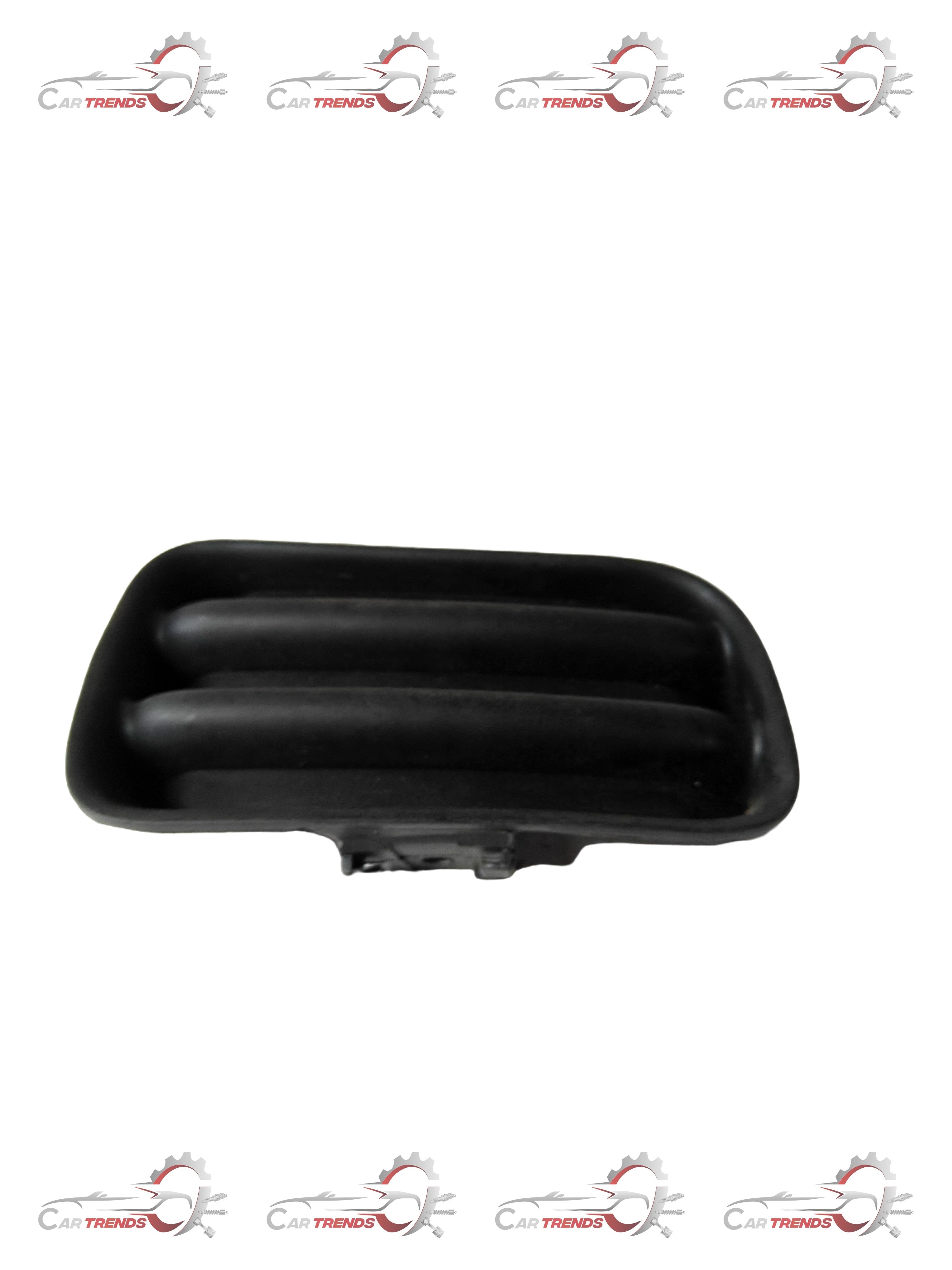 General Motors Tavera fog lamp cover hole on right side, showing the black plastic exterior and mounting details.