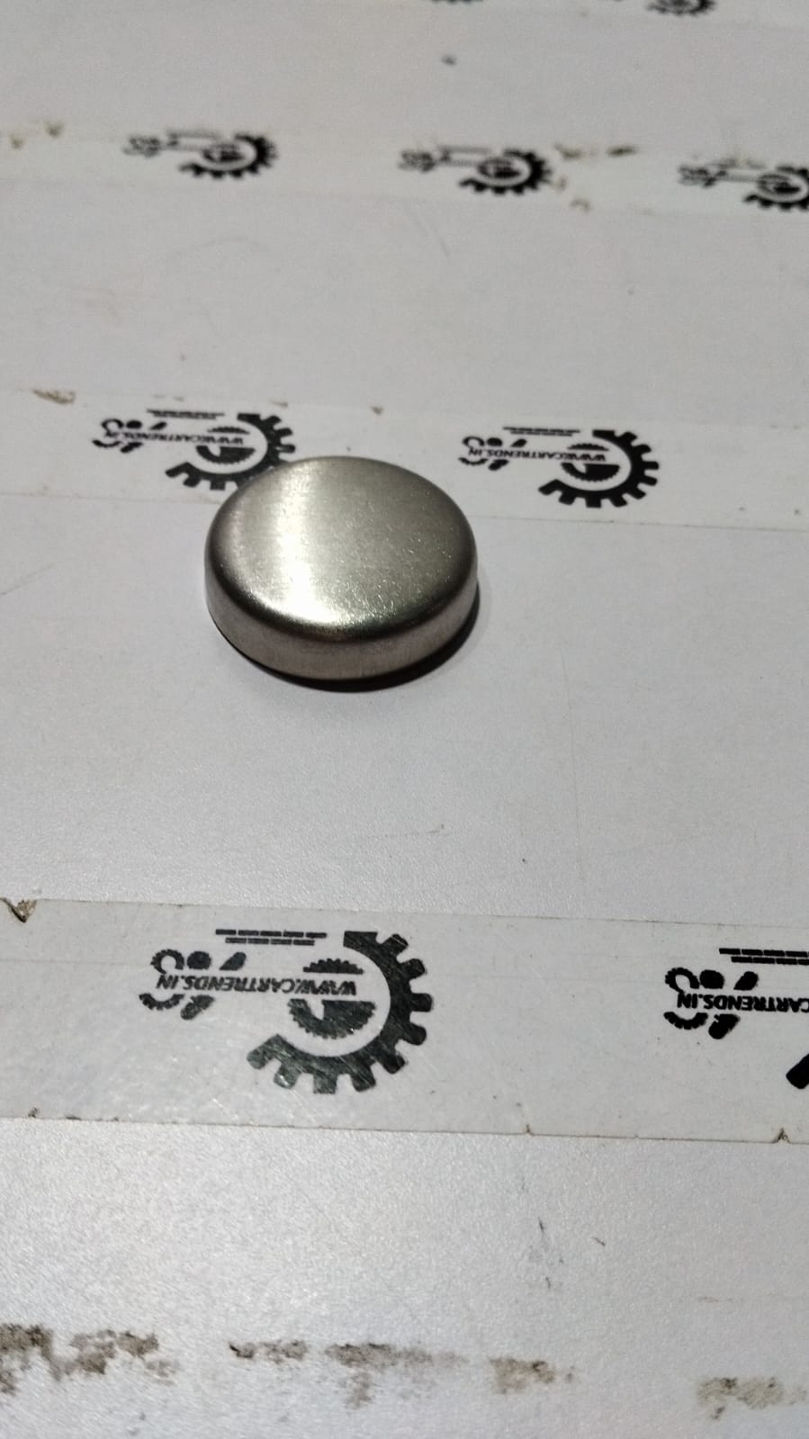 Chevrolet Tavera front or rear sealing cup by General Motors, visible rubber sealing component for vehicle part.