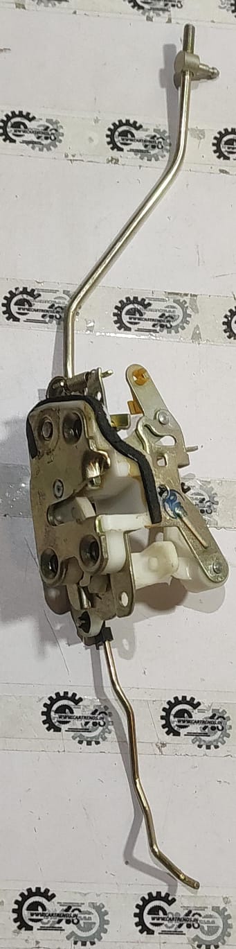 General Motors Tavera front left door latch, automotive part with metal and plastic components, installed on vehicle door.