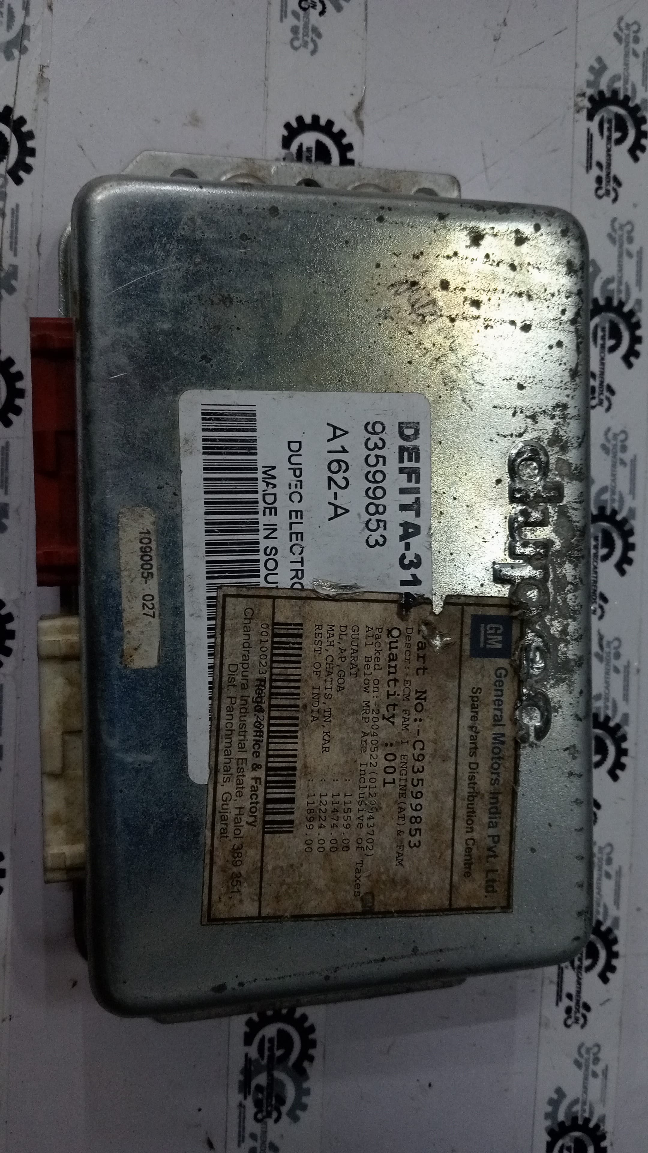 ECM FAM I engine for GM Astra, showing the engine component with brand markings and detailed metallic surface.