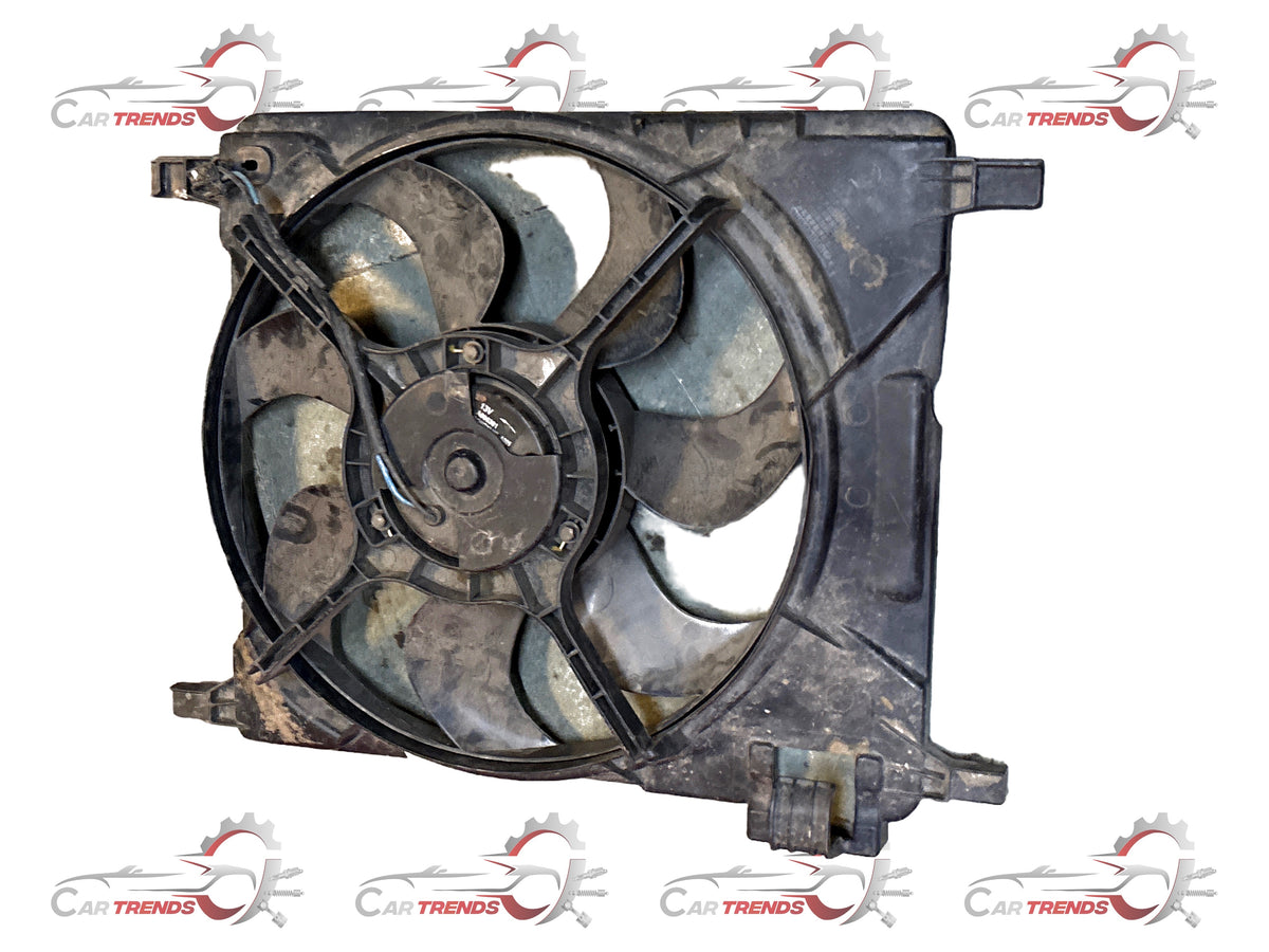 General Motors fan assembly in white with shared beat component, designed for engine cooling and ventilation.