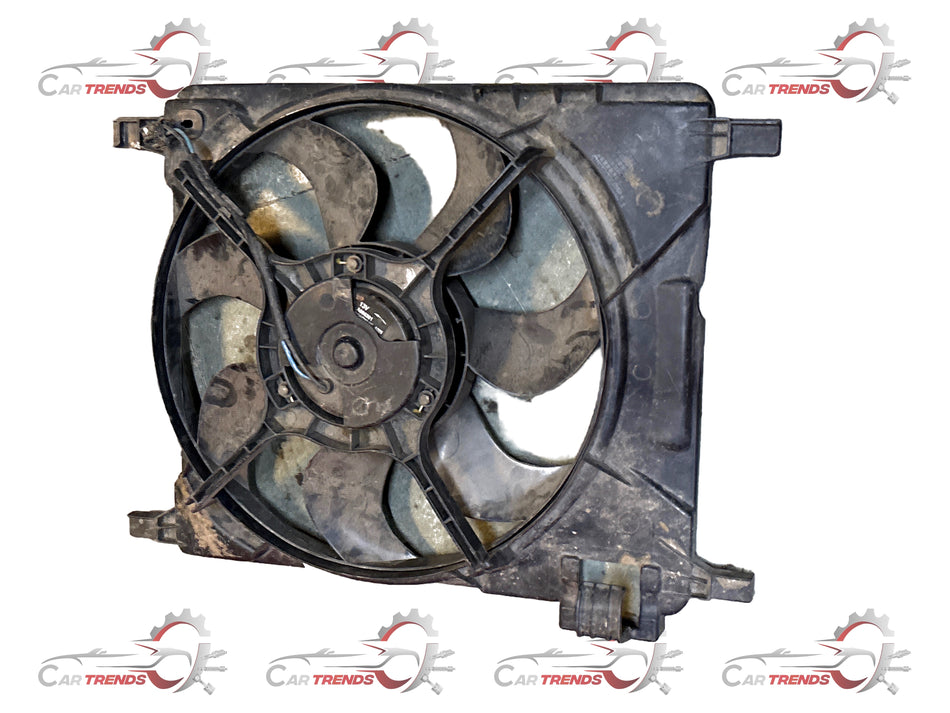 General Motors fan assembly in white with shared beat component, designed for engine cooling and ventilation.
