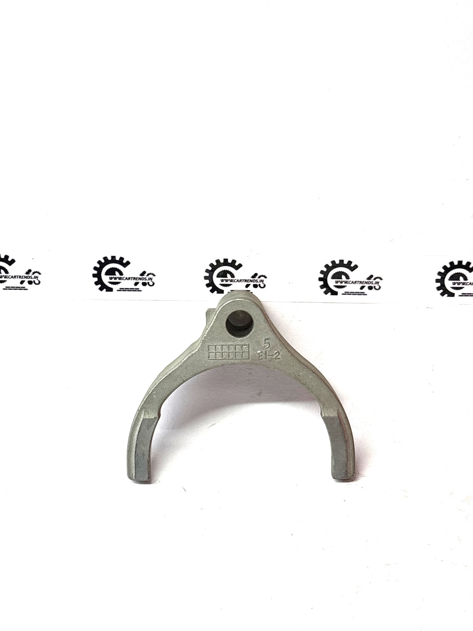 General Motors 5th gear shift fork, automotive replacement part, shown in the image with detailed metal components.