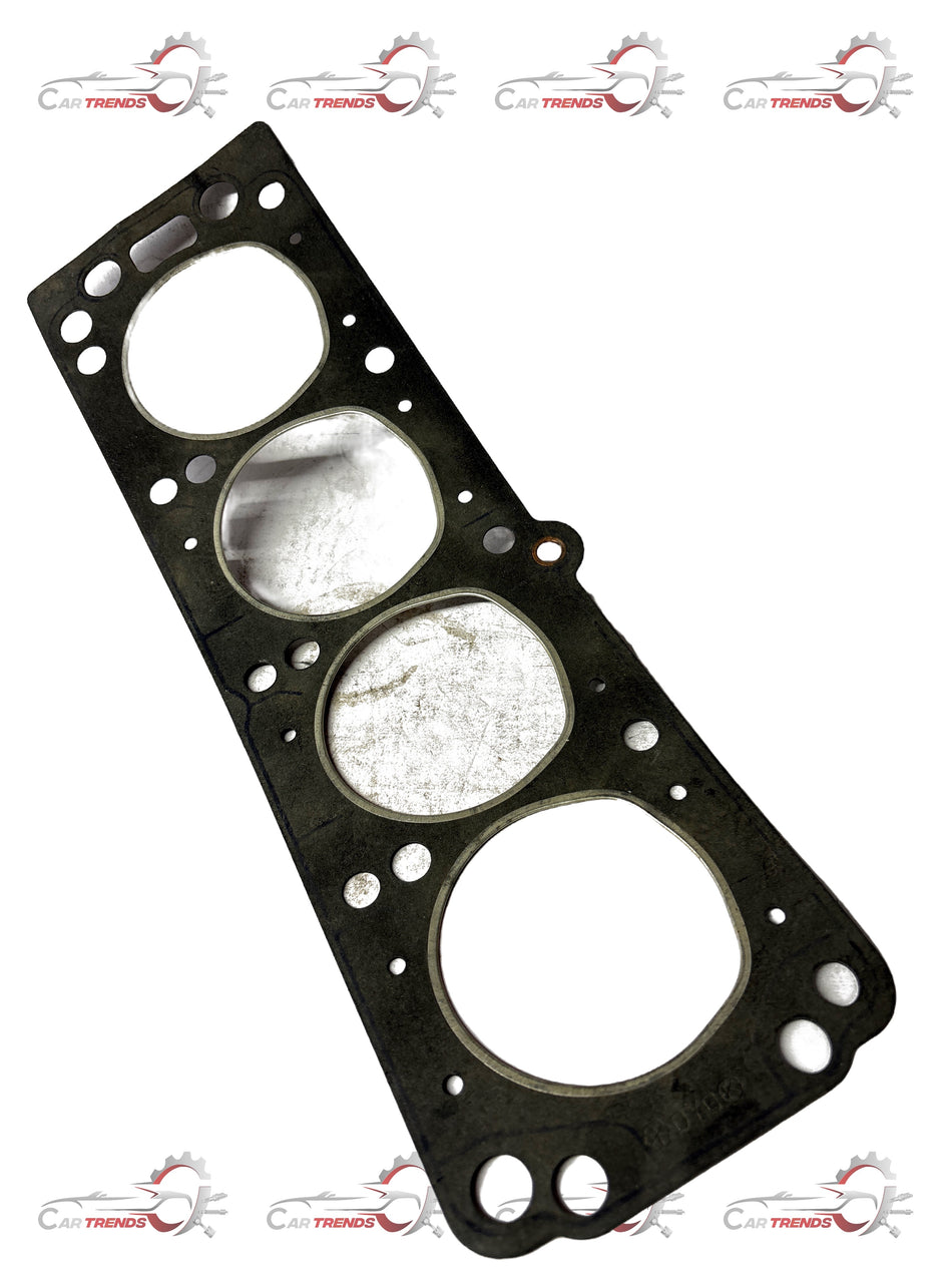 Gasket cylinder head for Chevrolet Optra by GENERAL MOTORS, showing the metal gasket with detailed surface design.