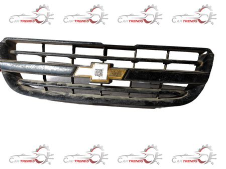 Silver grille radiator for Tavera by General Motors, compatible with T97595507 model, showing the front view of the vehicle part.