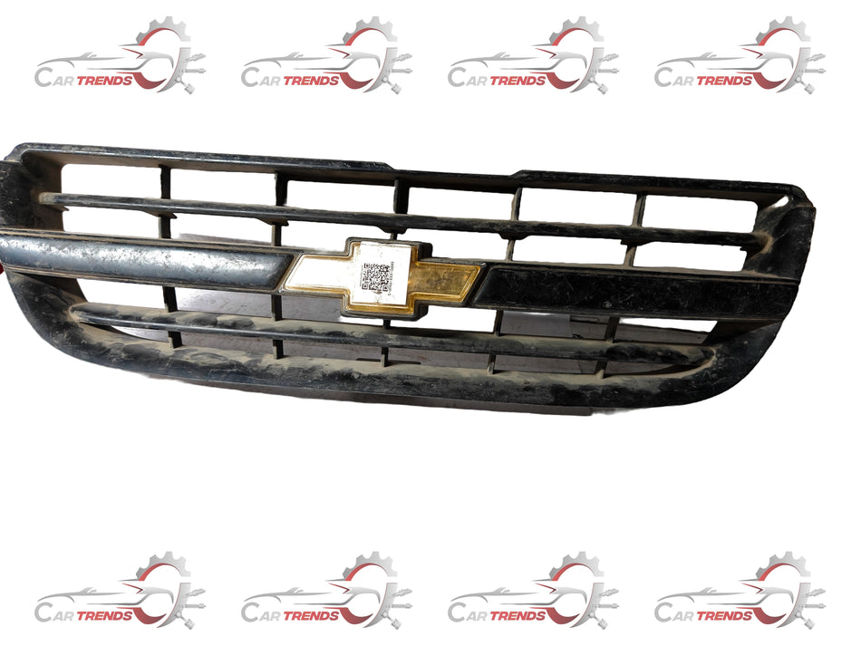 Silver grille radiator for Tavera by General Motors, compatible with T97595507 model, showing the front view of the vehicle part.