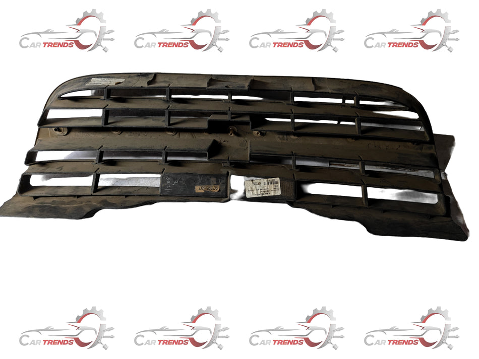 General Motors Tavera grille radiator T97595507, automotive front grille part for Tavera vehicle, black plastic with mesh design.
