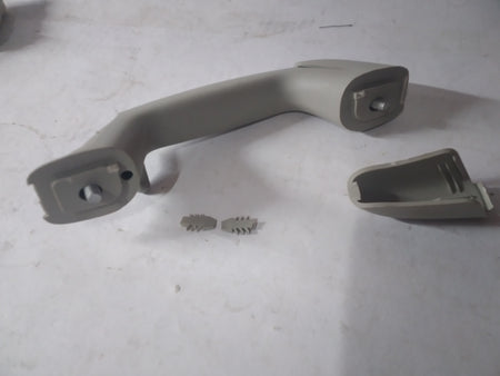 General Motors handle assembly for left-hand side, part J96909004, designed for vehicle door operation and replacement.