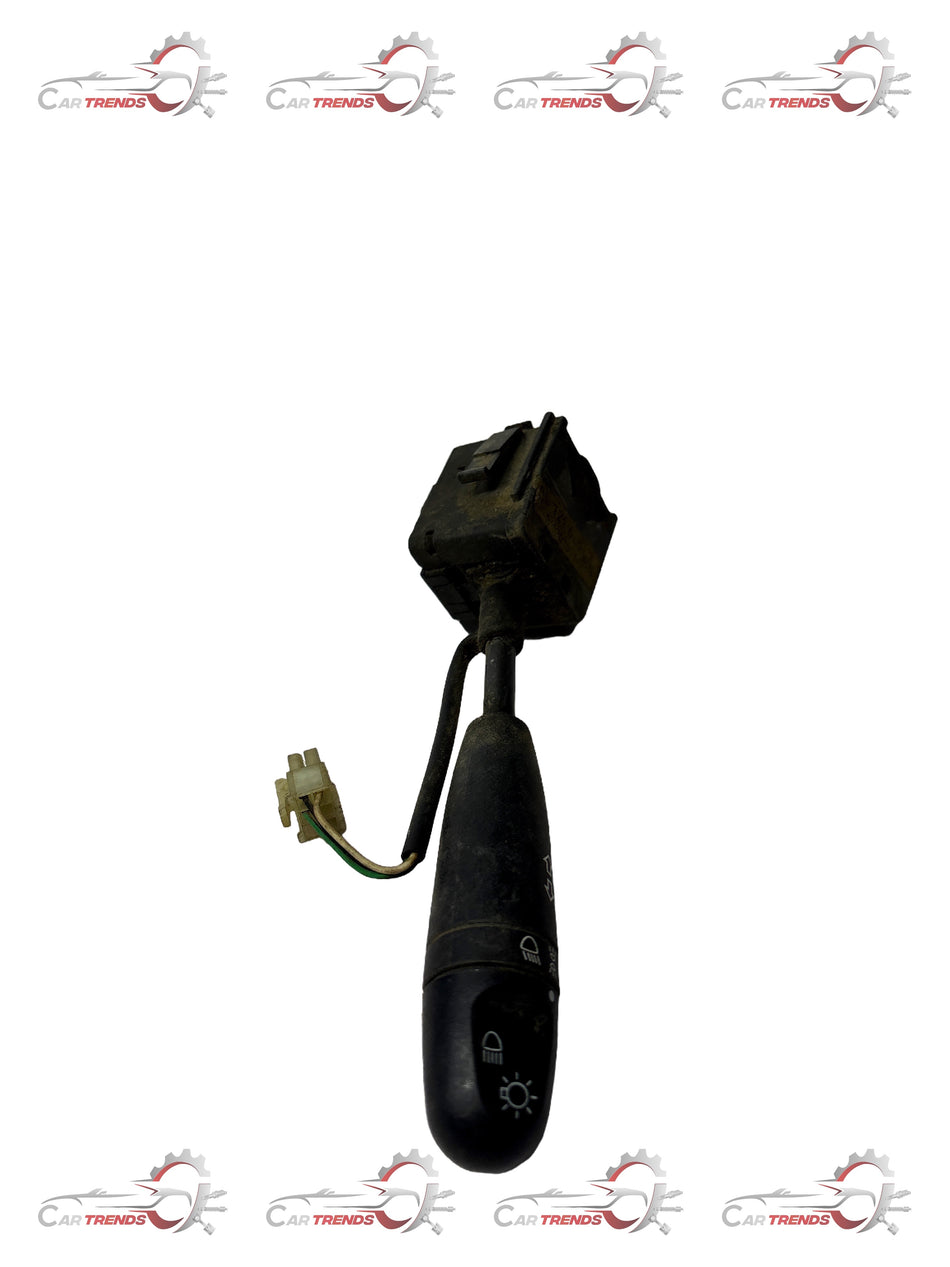 General Motors headlamp switch for Spark and Aveo, shown in black with connection ports, designed for vehicle lighting control.