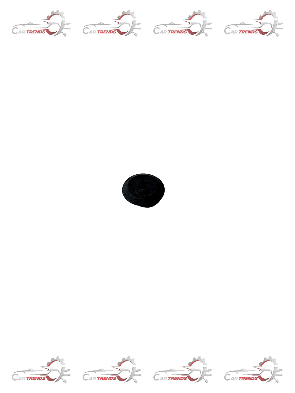 General Motors Aveo hole plug J94535715, a black plastic automotive part used for sealing or covering openings.