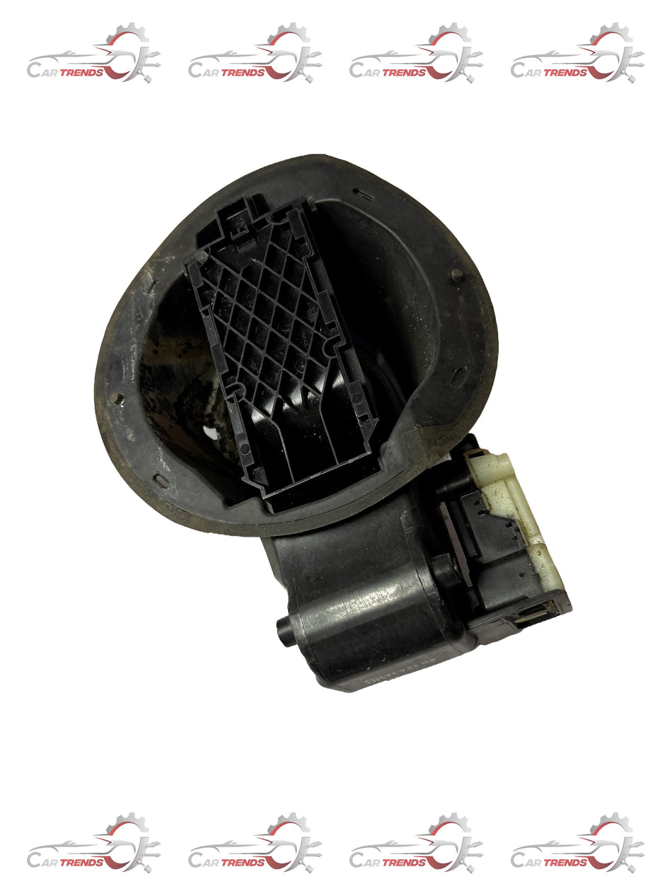 General Motors fuel tank filler pipe housing assembly for Chevrolet Cruze, showing the replacement part with connecting pipe.