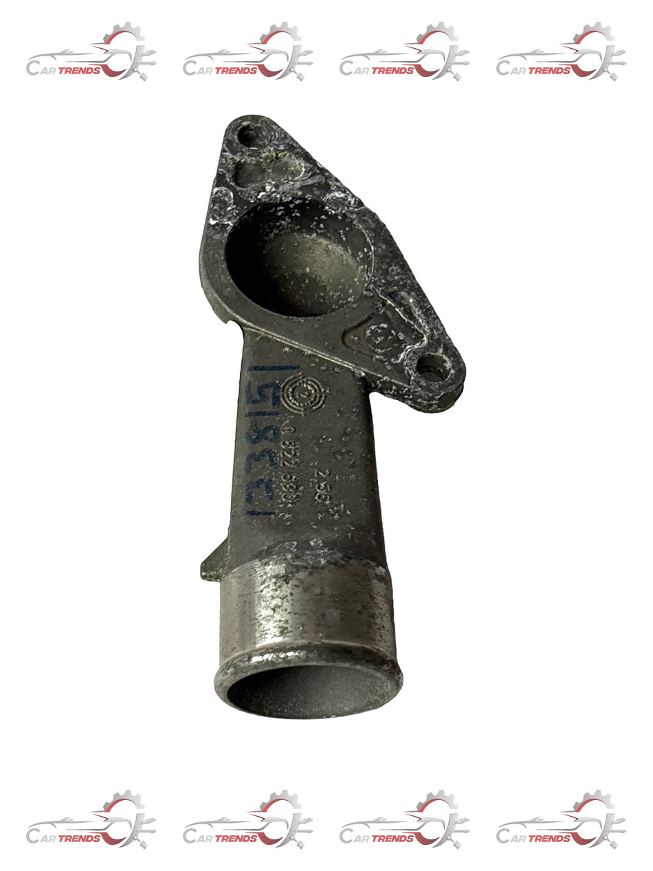 General Motors Astra housing thermostat, engine cooling component for vehicle temperature regulation, in black plastic.