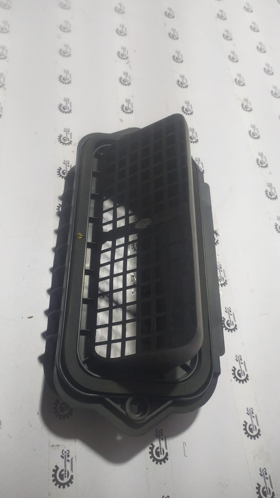 General Motors inlet air filter for Chevrolet Cruze, durable engine air intake component with brand logo visible.