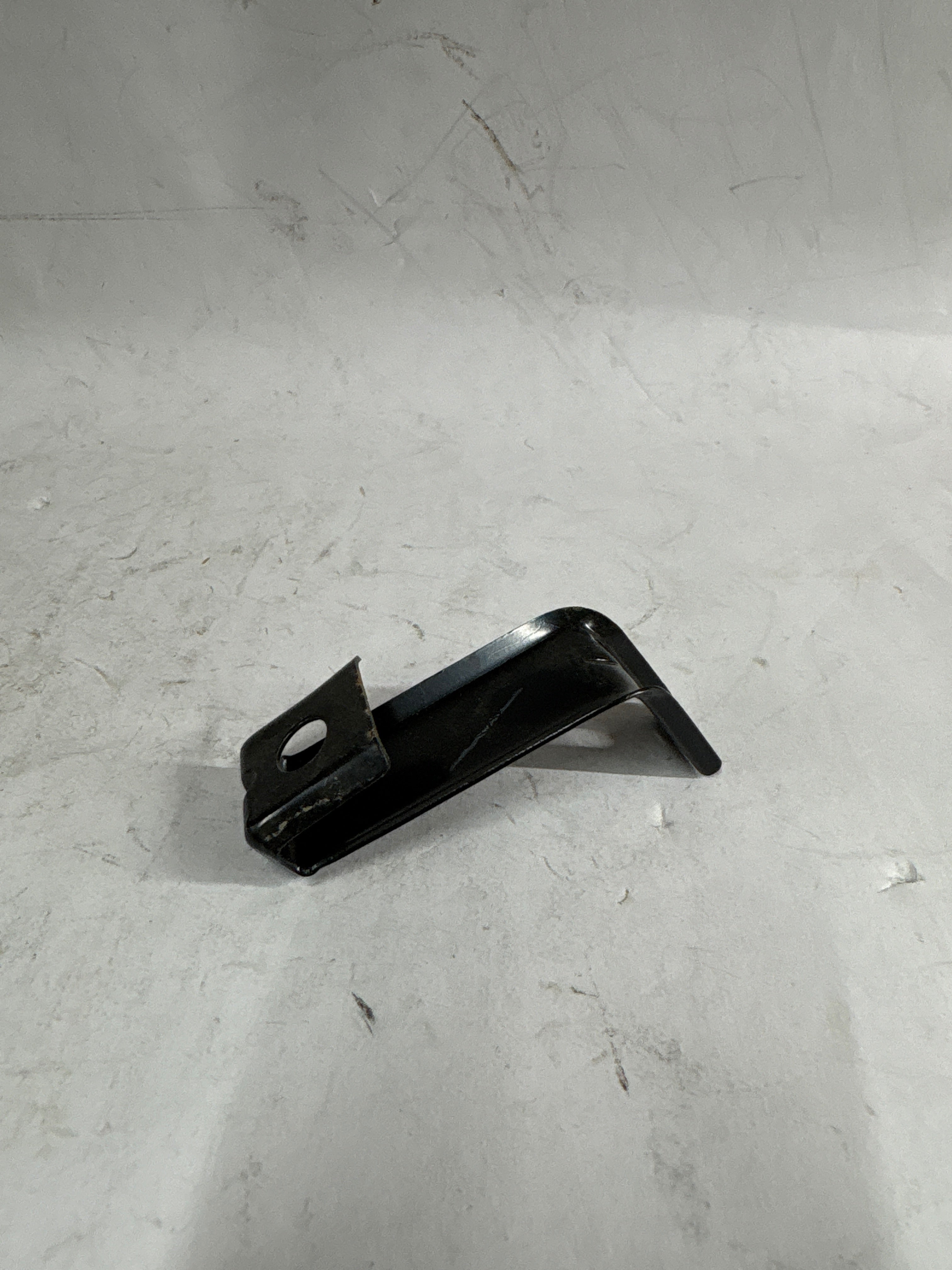 General Motors Optra front support bar, automotive part showing the sturdy metal structure and mounting points.
