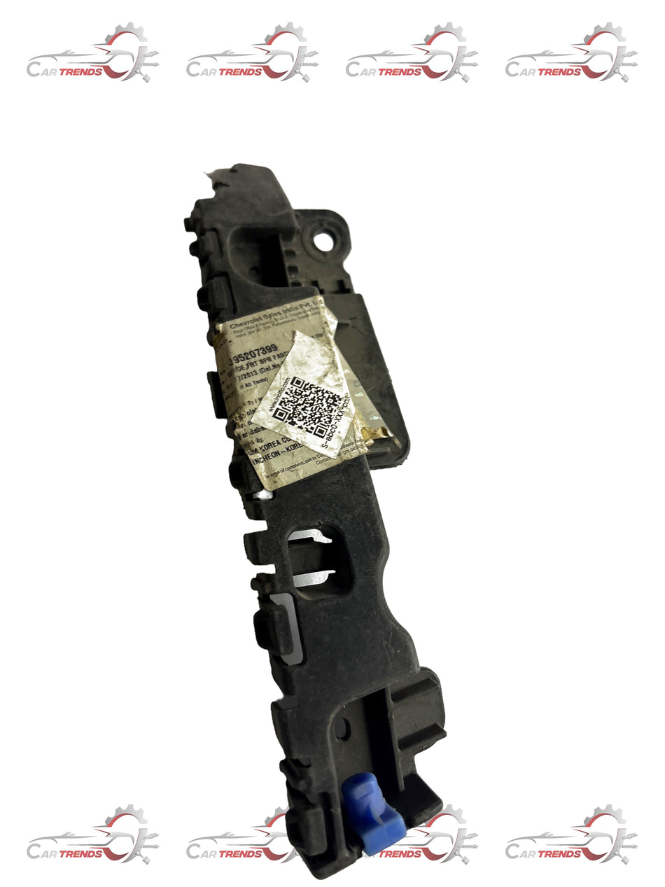 General Motors front bumper bracket for Chevrolet Cruze, showing the metal support component mounted on a vehicle.