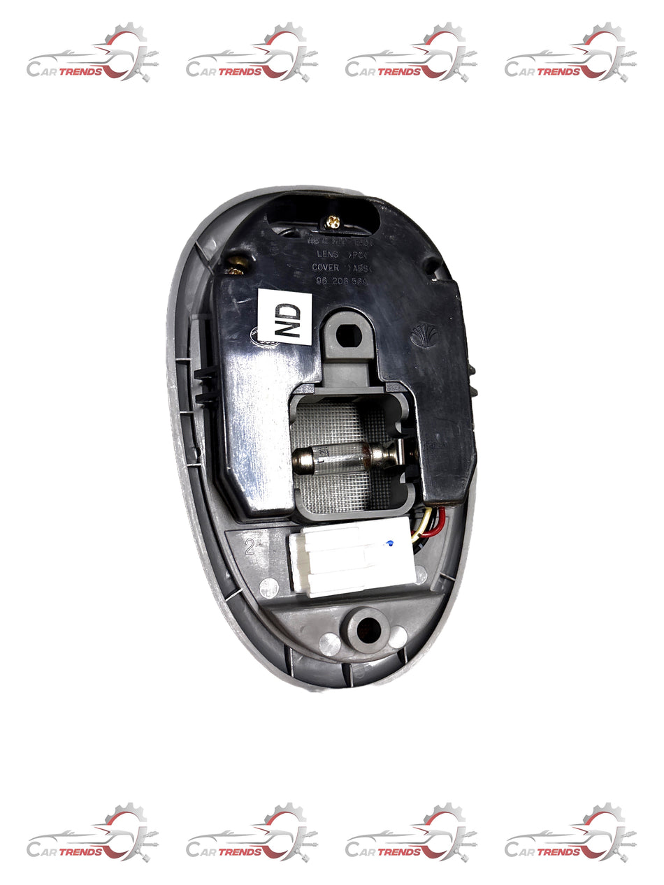 Center room lamp for Opel Optra Petrol by General Motors, automotive interior lighting part, black plastic with bulb socket.