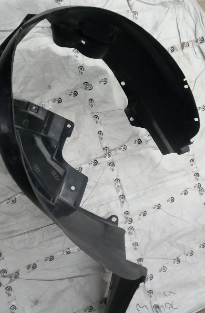 LH liner fender for Chevrolet Optra by General Motors, showing the black plastic exterior part with mounting edges.