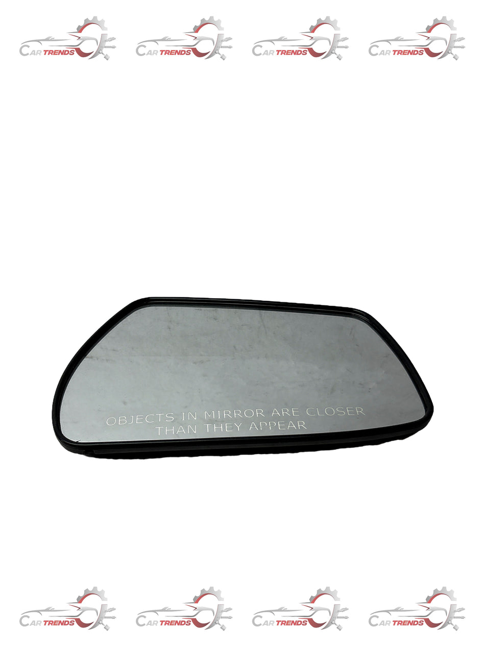 General Motors rearview mirror with reflective glass and background plate, designed for vehicle visibility and safety.