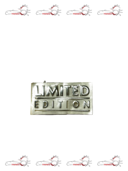 Limited edition General Motors Aveo nameplate with metallic finish, showcasing the vehicle's model and branding details.