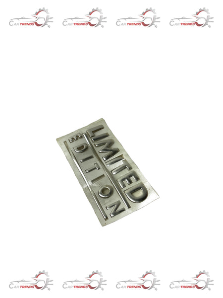 Limited edition AVEO nameplate by General Motors, featuring sleek design and clear branding on a metallic surface.