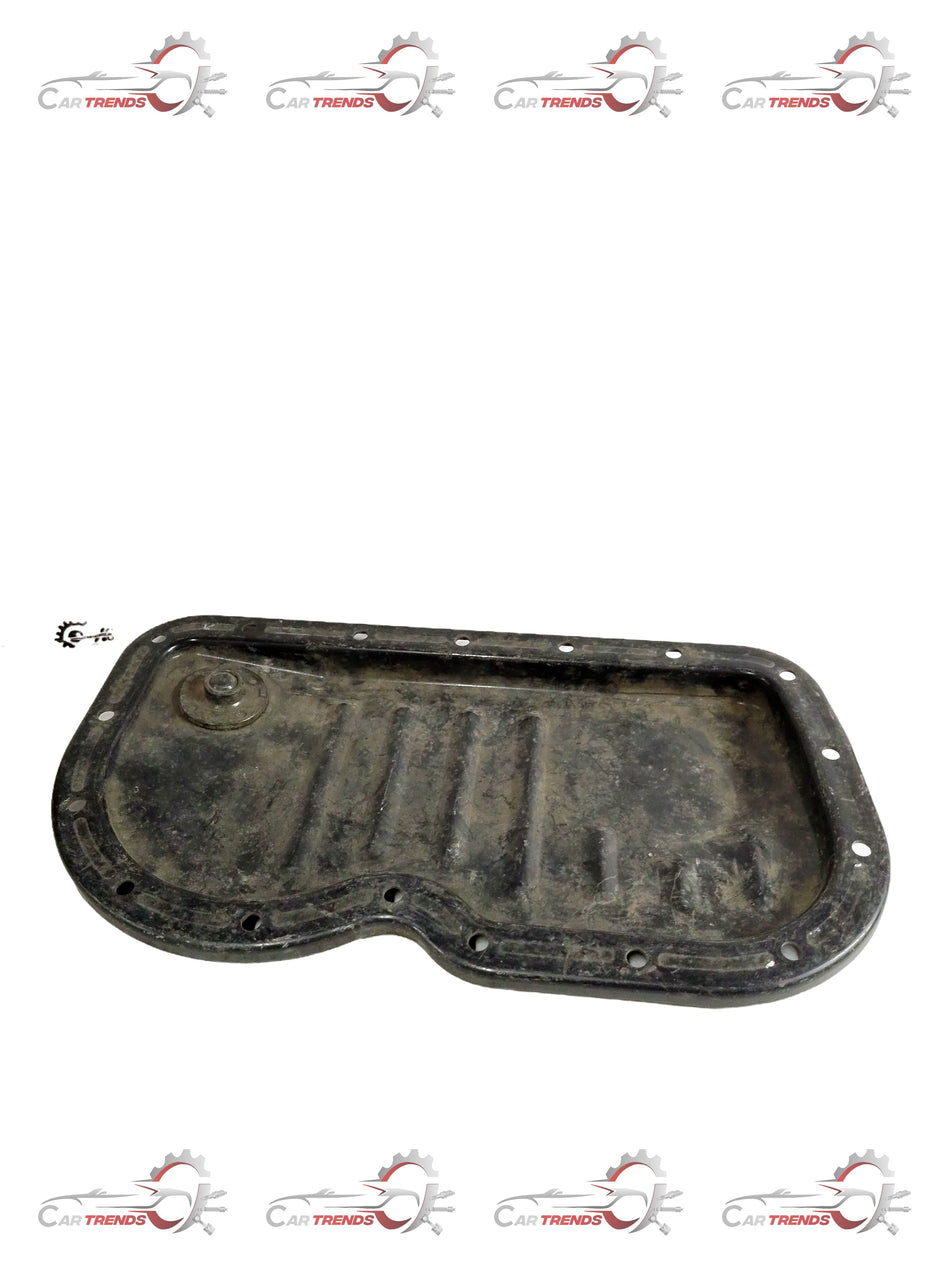 General Motors oil chamber for Tavera T97690121, automotive engine component with detailed metal construction.