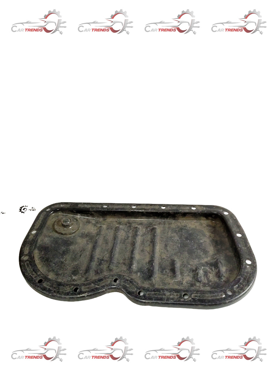 General Motors oil chamber Tavera T97690121 for Tavera vehicle, showing the engine component in black metal with mounting features.