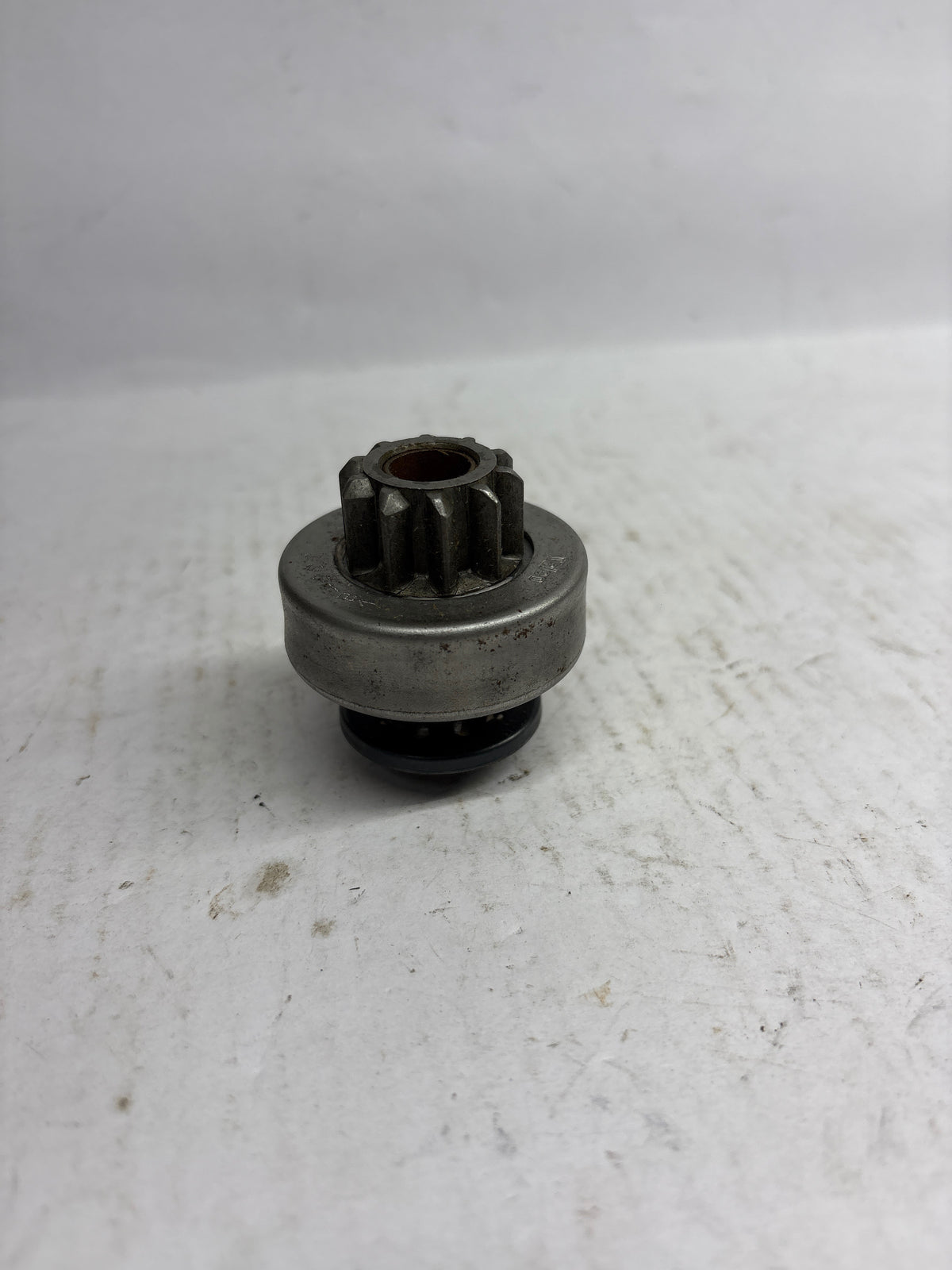General Motors Astra PINION STARTER 6203150 for vehicles, showing the starter motor component with wiring and mounting parts.