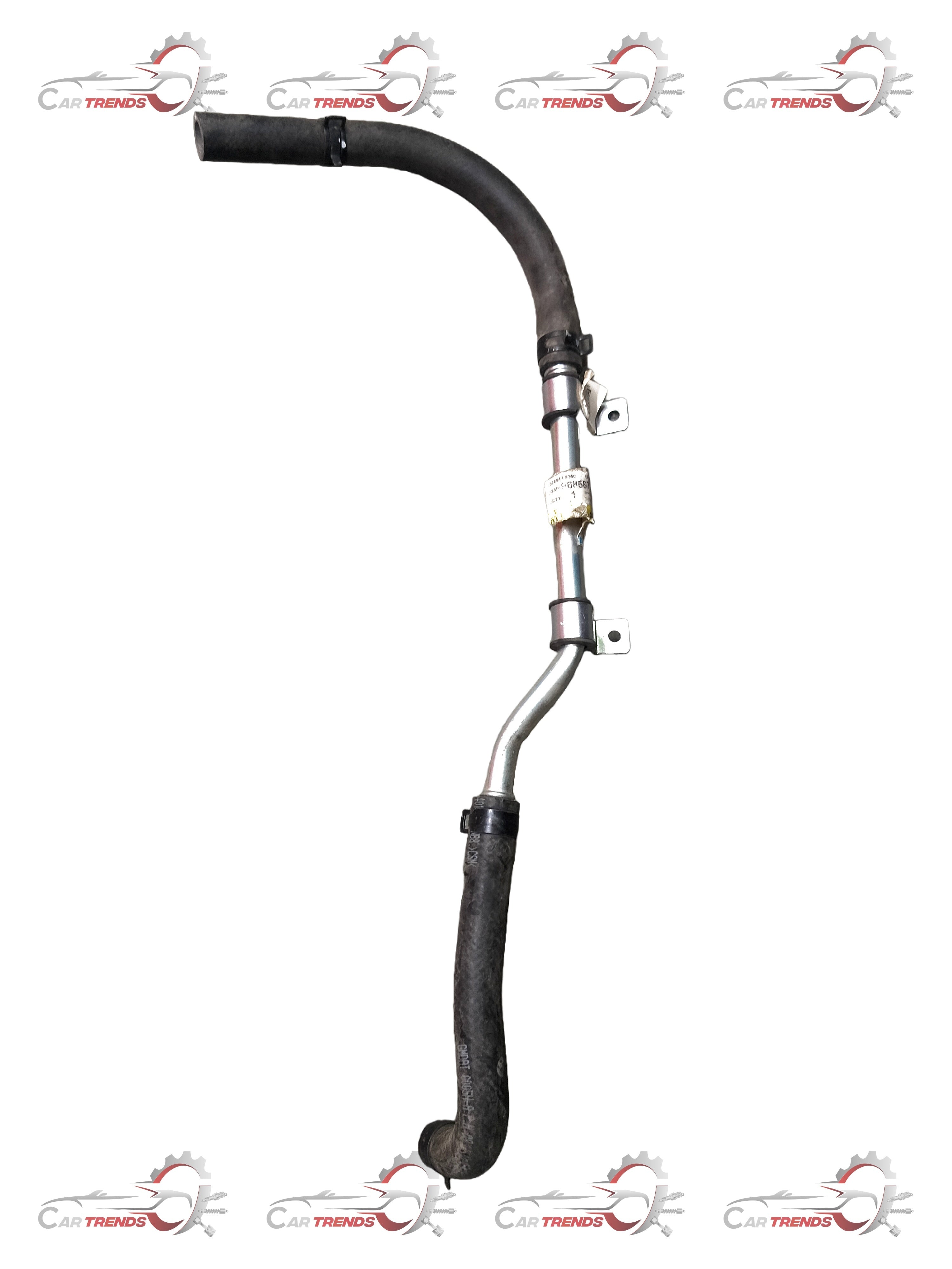 General Motors Optra petrol pipe suction component, detailed view of the engine part for vehicle maintenance.