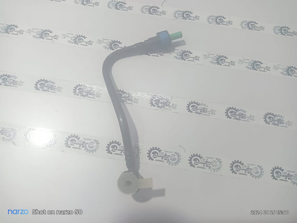 General Motors fuel feed pipe for Chevrolet Cruze, showing the metal automotive part with threaded fittings.