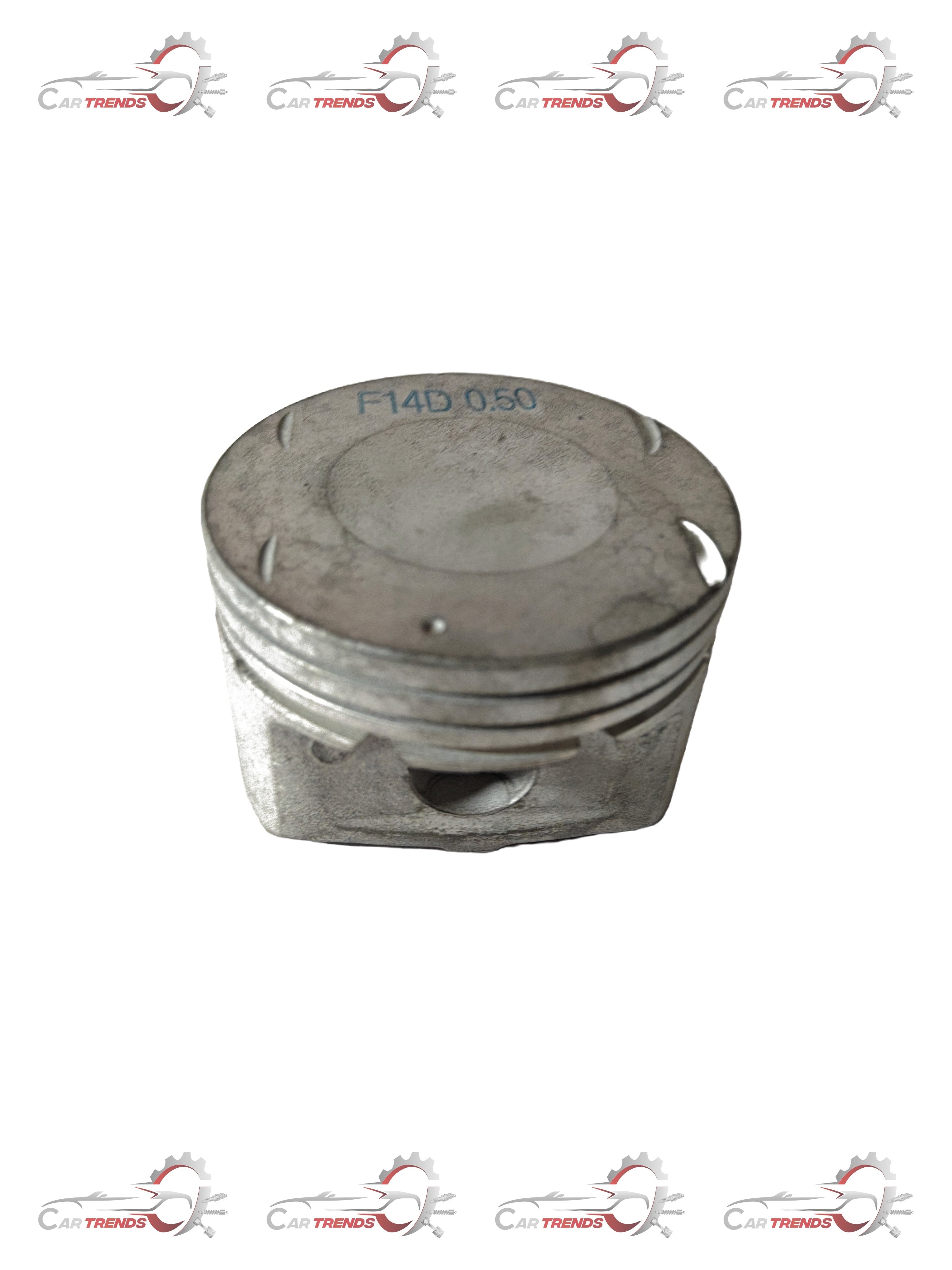 General Motors Aveo piston part J93740421, close-up view showing metal piston with detailed surface finish.