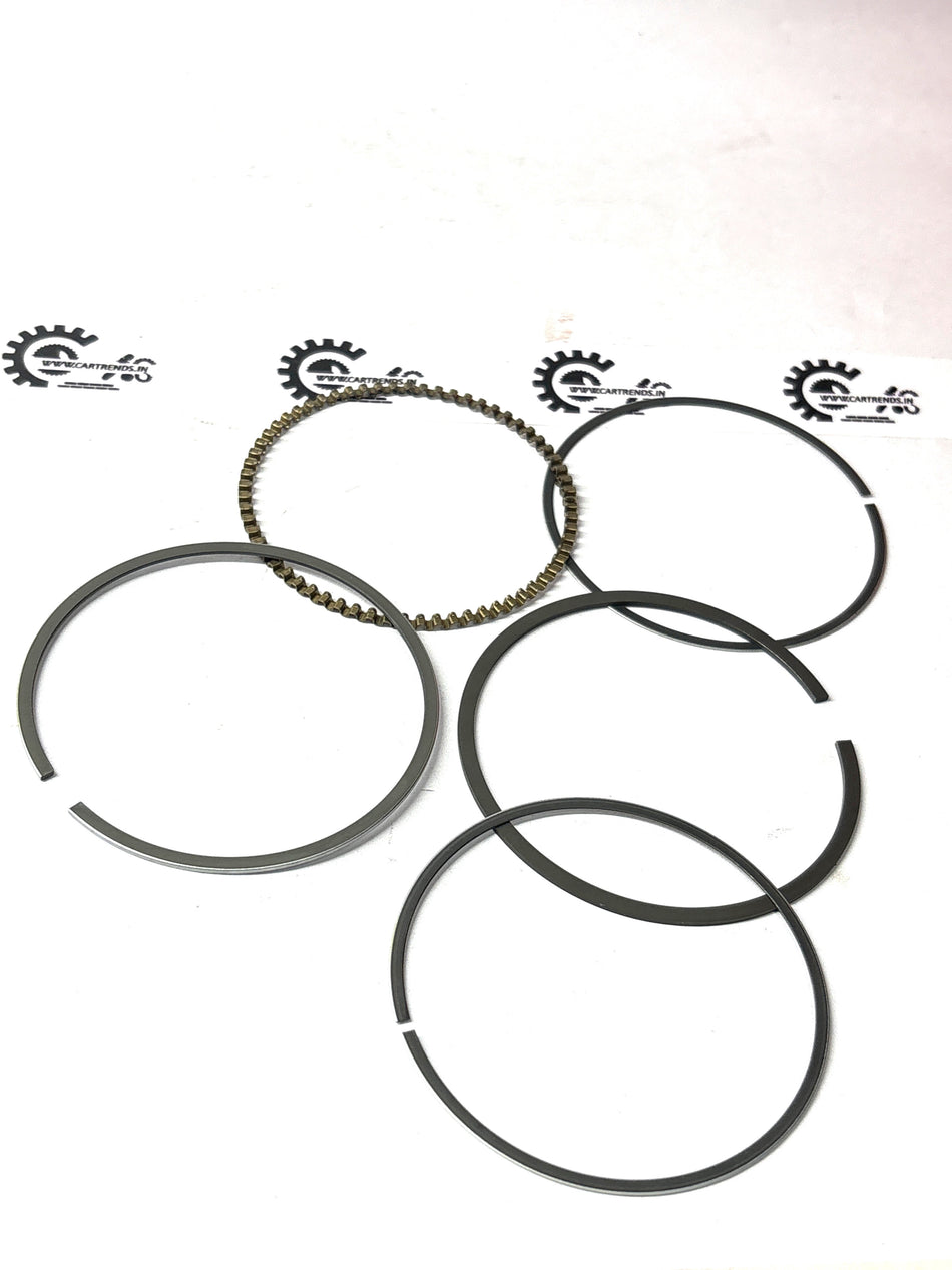 General Motors piston ring kit Beat J93745804 showing metal rings for engine repair and maintenance.