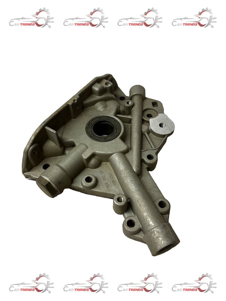 General Motors oil pump assembly for Corsa S93293030, automotive engine component with detailed metal parts and pulley system.