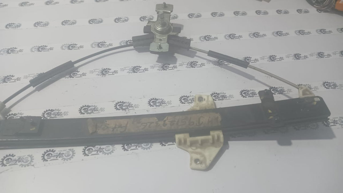 General Motors front window lift regulator for vehicle, showing the mechanical component for window operation.