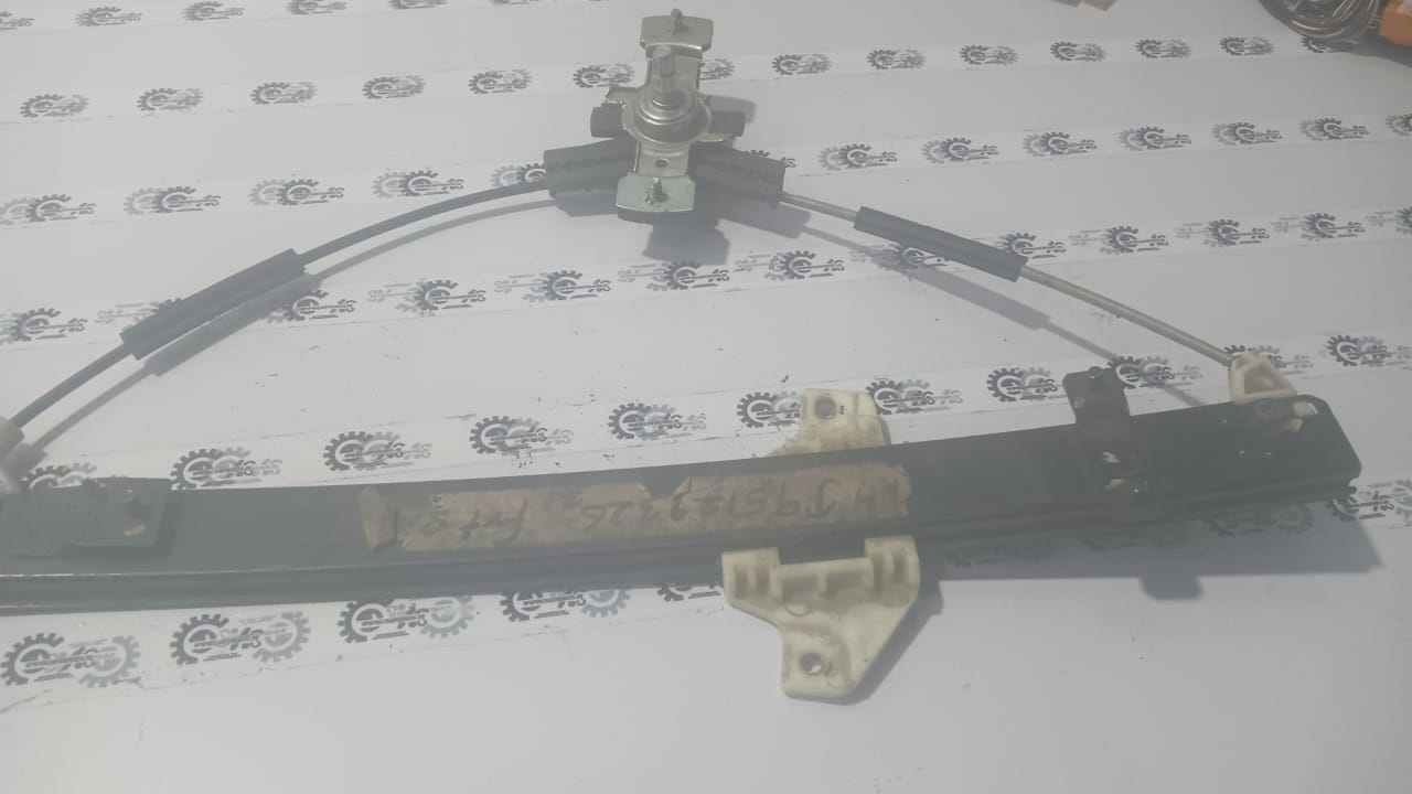General Motors front window lift regulator for vehicle, showing the mechanical component for window operation.