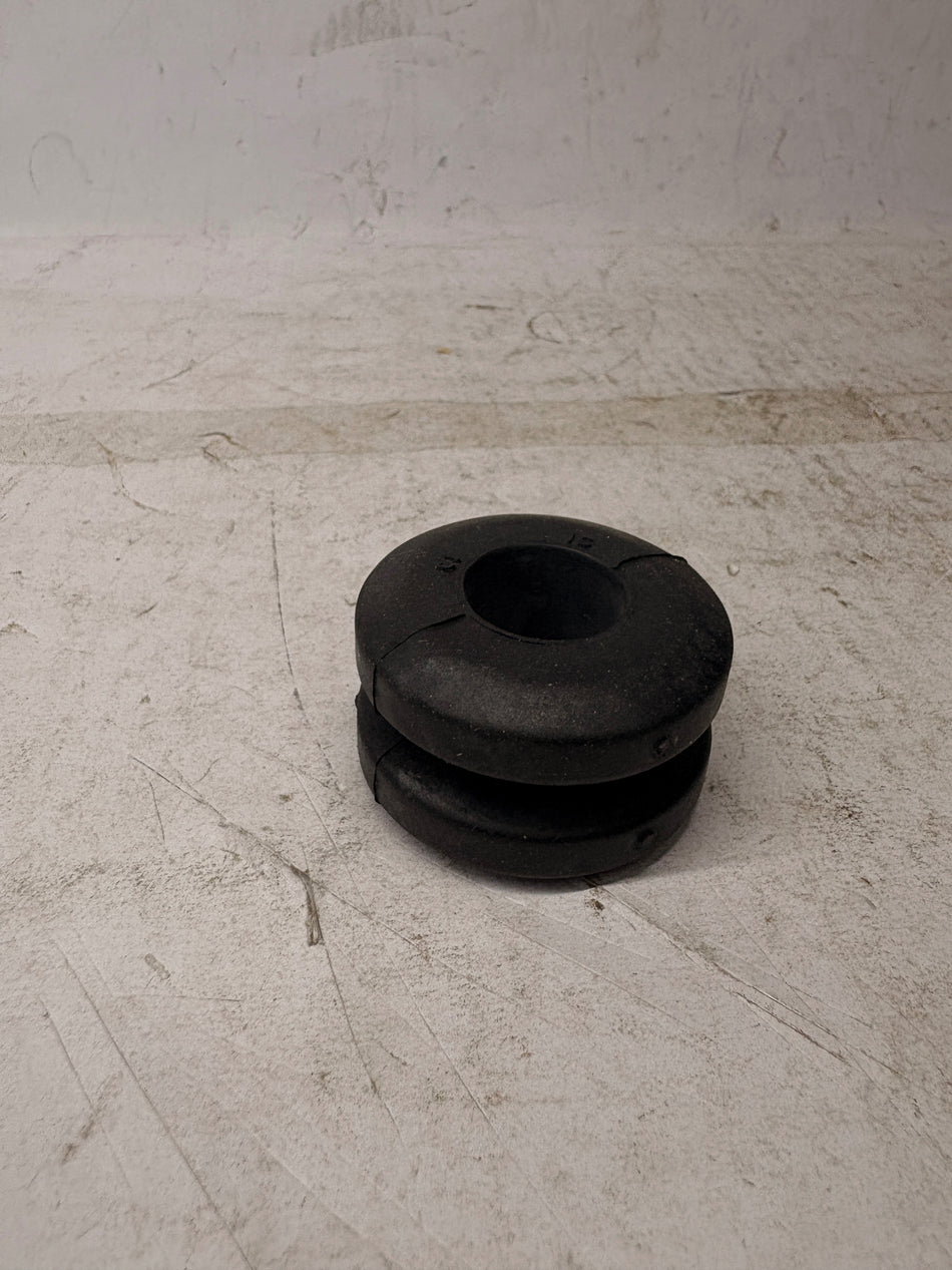 Rubber cushion strut bar for Tavera by General Motors, showing the black rubber component used in vehicle suspension.